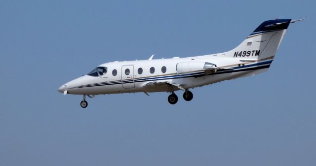 Beechcraft Beechjet (N499TM) - On final is this 2010 Hawker-Beechcraft Beechjet 400A in the Winter of 2019.