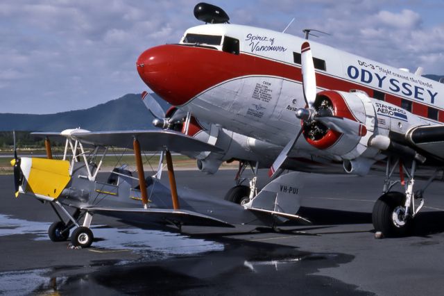 OGMA Tiger Moth (VH-PUI) - DE HAVILLAND DH-82A TIGER MOTH - REG : VH-PUI (CN 1084) AND DOUGLAS DC3 REG C-FGXW (CN 13868/25313) - CAIRNS INTERNATIONAL AIRPORT QUEENSLAND AUSTRALIA - YBCS 24/6/1986