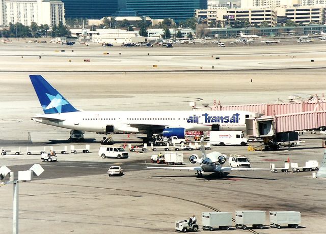 Boeing 757-200 (C-GTSE) - KLAS - Intl dock at LAS always had something different throughout the week. This was my 1st photo of an Air Transat 757, and my last.