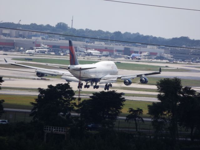 Airbus A330-300 (N675NW) - From our 9th floor balcony, approx. .98 mile zoom