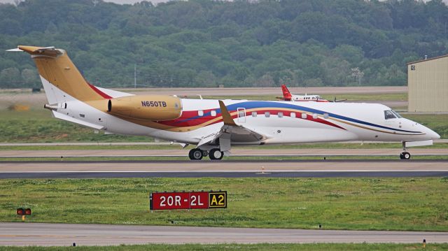 Embraer Legacy 600/650 (N650TB) - Photos were taken from the Airport Observation Area on Vultee Boulevard in poor lighting.