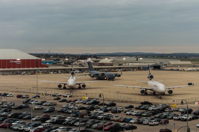 Boeing Globemaster III (03-3115) - A US Air Force C17 parks behind two former lufthansa cargo MD11f destined for UPS.