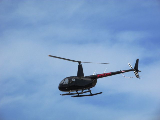 Robinson R-44 (N7037U) - Lifting off from Santa Ana