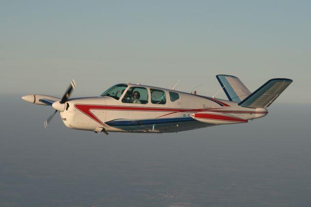 Beechcraft 35 Bonanza (N81KT) - In flight formation with an RV4