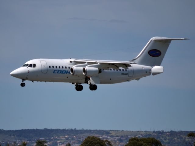 VH-NJG — - About to land on runway 05, on arrival from a regional location.