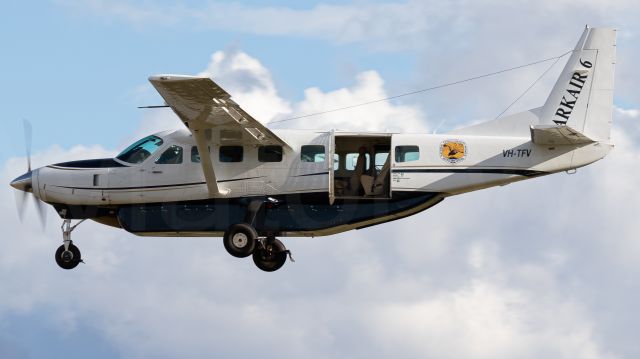 Cessna Caravan (VH-TFV) - Note the missing door 