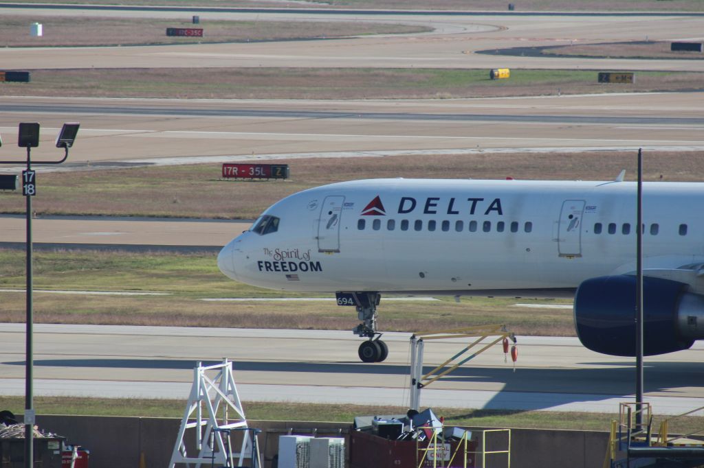 Boeing 757-200 (N694DL) - 111113 The Spirit of Freedom taxiing out on Kilo