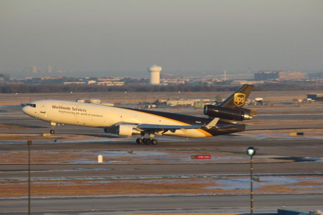 Boeing MD-11 (N283UP) - 121013 UPS rotating from Rwy 35L