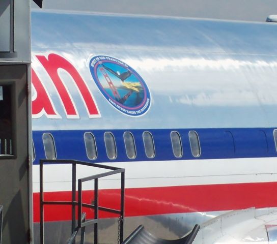 BOEING 767-300 (N351AA) - Not the best picture considering I was using a 2005-era digital camera but was able to shoot this "Spirit of San Francisco Employees Making the Difference" decal on AA 767-323/ER N351AA at ORD on June 29, 2010.