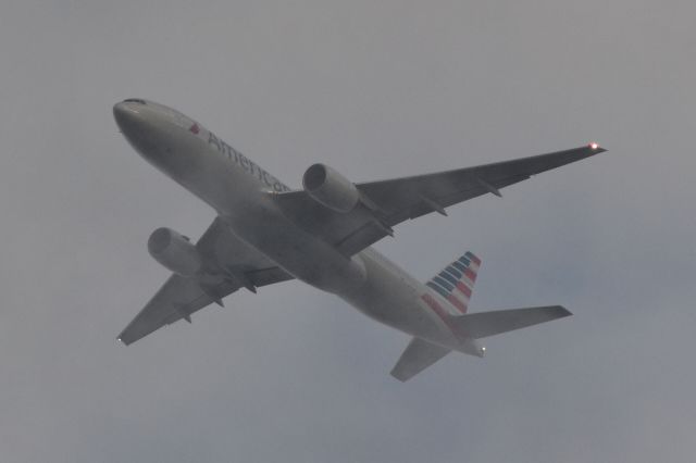 Boeing 777-200 (N771AN) - Breaking out of the clouds at approximately 4000' over Lake Norman on approach to KCLT - 1/3/21