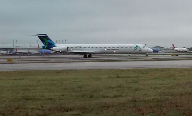 McDonnell Douglas MD-83 (N806WA) - What a surprise! World Atlantic MD-83 arrived on a rainy day in Dallas. Sorry for the blurred photo, thought it was worth posting. Arriving from Chesapeake Bay, VA