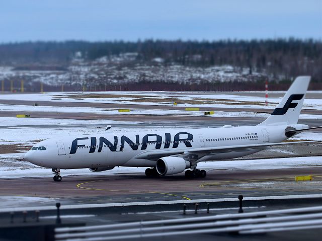 Airbus A330-300 (OH-LTT) - Flight from Shanghai to Helsinki. Photo taken on March 21 2021 from the scenic terrace at the Helsinki Vantaa airport.