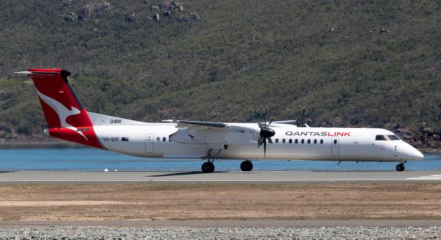 de Havilland Dash 8-400 (VH-QOF) - Back tracking RWY 14 for departure