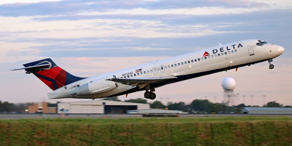 Boeing 717-200 (N933AT) - Delta's N933AT (ex-TWA and ex-American as N2404A; ex-Air Tran as N933AT), a B712, has just rotated off Runway 5 and is beginning its climb as it departs BUF for an early morning trip to MSP (Minneapolis/St. Paul).