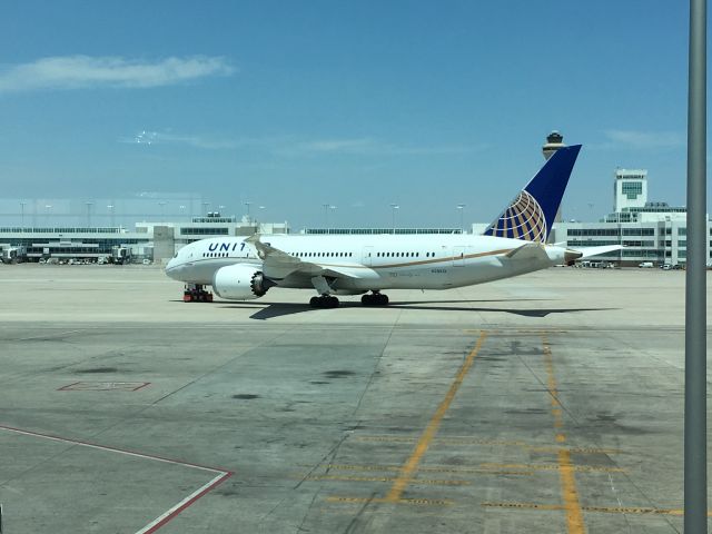 Boeing 787-8 (N28912) - This plane was prepared at Concourse A before being towed to Concourse B for boarding. Photo was taken from gate A37 at Denver International. br /Early afternoon on June 28, 2016.