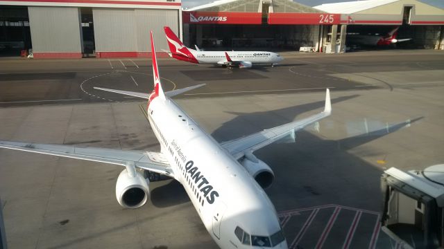 Boeing 737-800 (VH-VZY) - Two Qantas Boeing 737-800 at Sydney Domestic, taken from Qantas Club