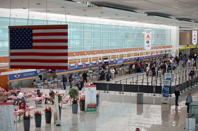 — — - Southwest Airlines check-in counter at BWI. SWA inhabits Piers A and B in Baltimore.