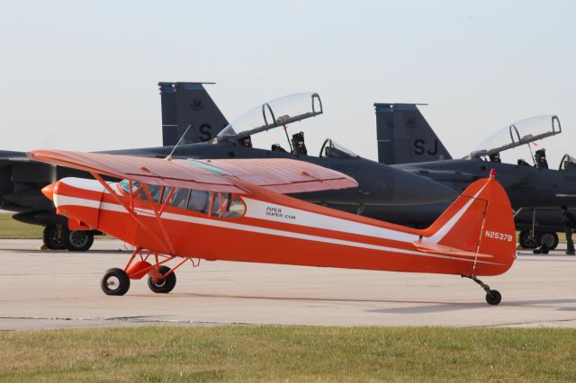 Piper L-21 Super Cub (N2537B) - 334th Fighter Group F-15s from Seymour Johnson make a nice background for the Super Cub.  