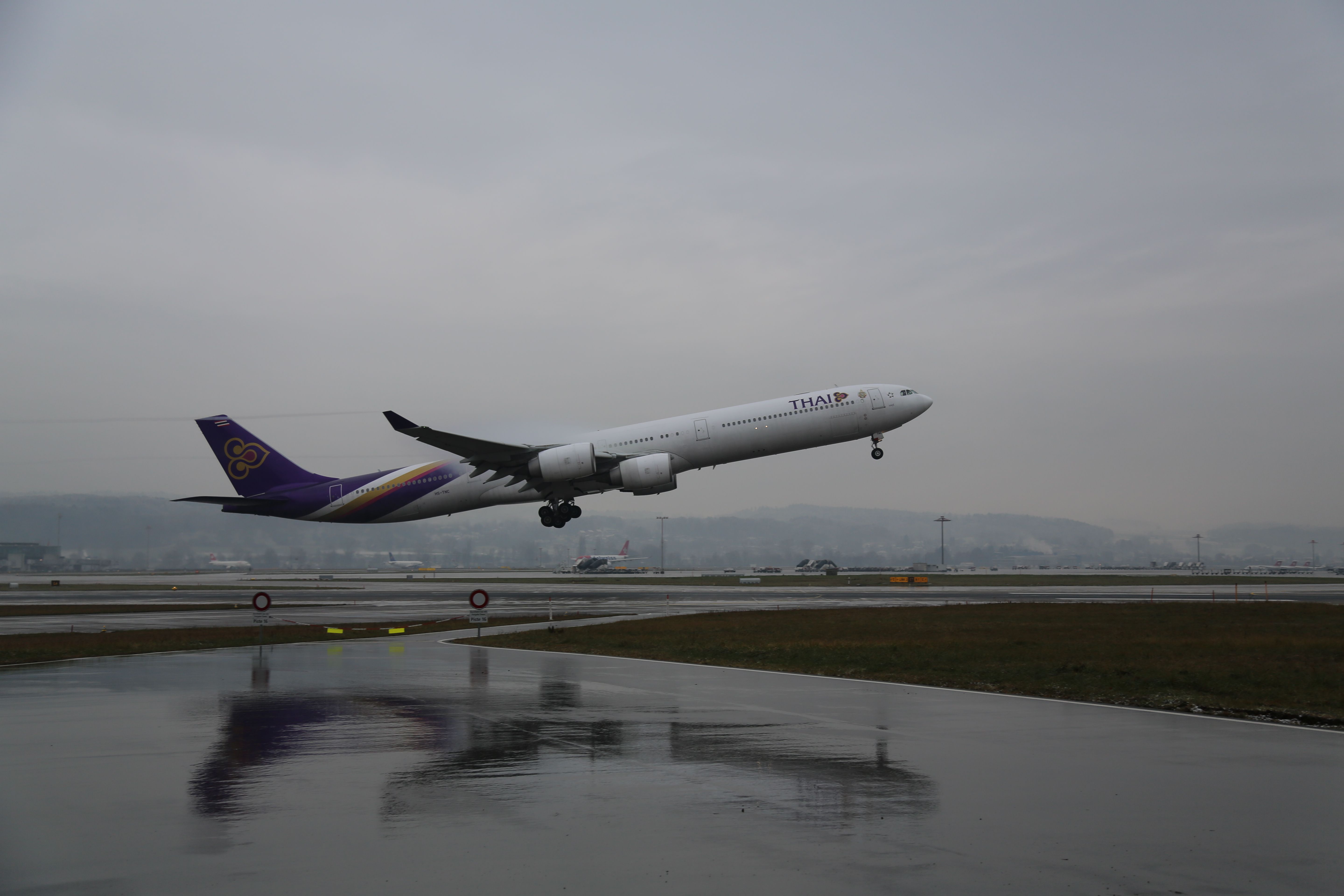 Airbus A340-600 (HS-TNC) - reflections...