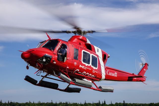 Bell 412 (C-GCGQ) - Coast Guard 944 lifting off from the ramp in Port Hawkesbury.