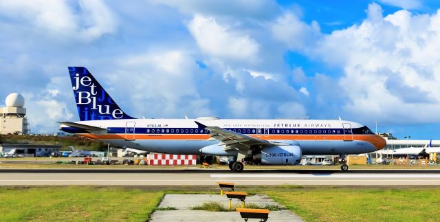 Airbus A320 (N763JB) - Jet Blue retro landing at TNCM St Maarten.