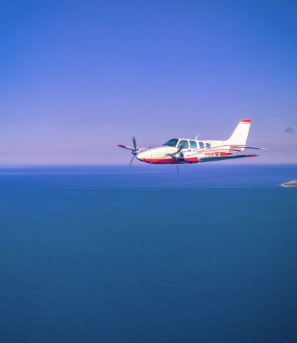 Beechcraft Baron (58) (N58LS) - formation flying over Cape Cod