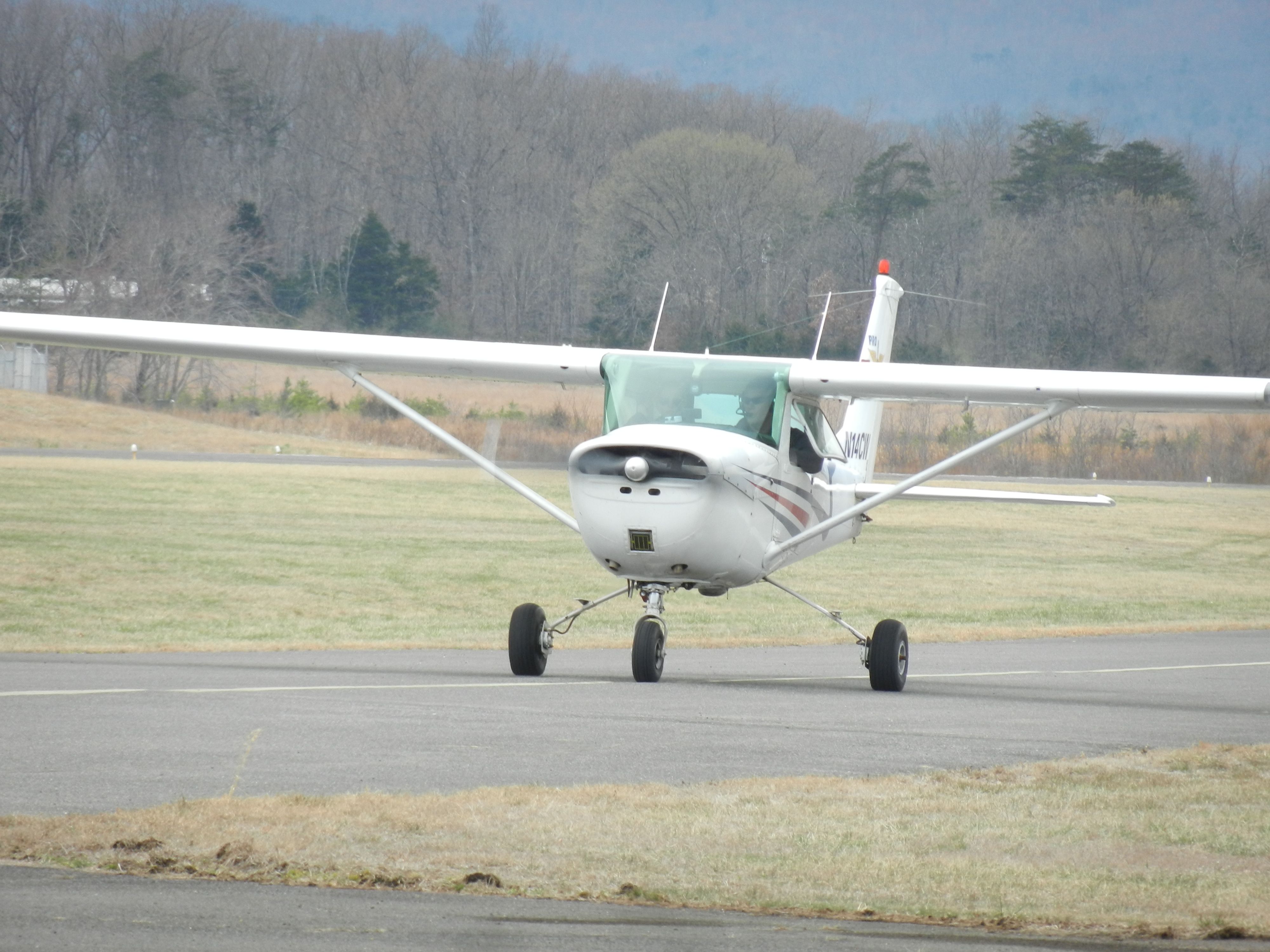 Cessna Skyhawk (N14CW) - A Cessna 172 Taxies Toward The Runway To Takeoff 