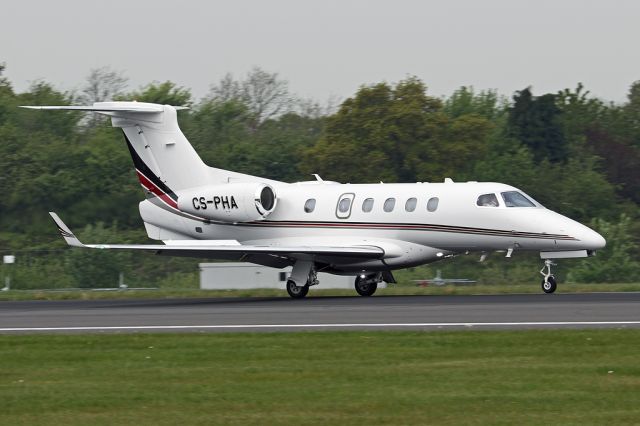 Embraer Phenom 300 (CS-PHA) - Netjets are regular visitors to Manchester