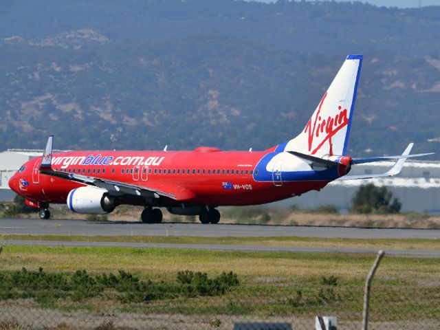 Boeing 737-800 (VH-VOS) - Rolling for take off on runway 05. Thursday 12th April 2112.