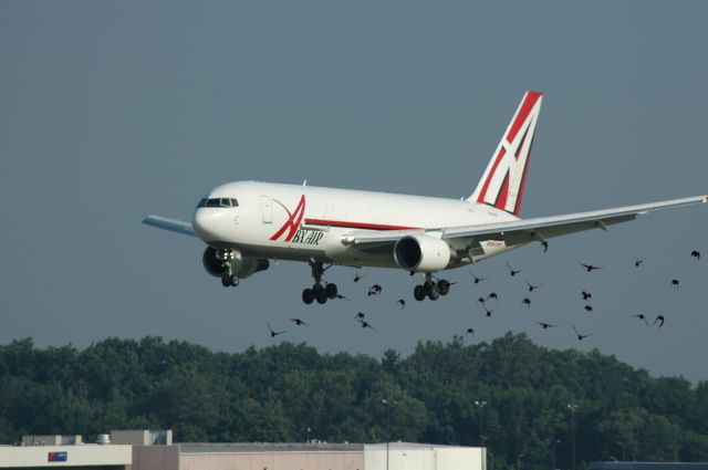 BOEING 767-200 (ABX201) - landing on 18L with a few to many birds in the area