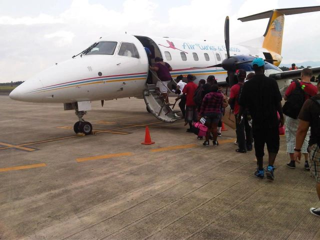 Embraer EMB-120 Brasilia (VQ-TMJ) - HEADING BACK TO THE TURKS AND CAIOCS ISLANDS FROM THE DOMINICAN REPUBLIC.