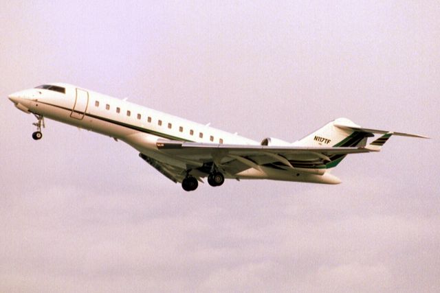 Bombardier Global Express (N117TF) - Airborne off rwy 26 on 28-Jan-04.  Reregistered N717TF 23-Sep-06, exported to Bermuda 27-Oct-06 where it became VP-BSE then reregistered D-AFAM.