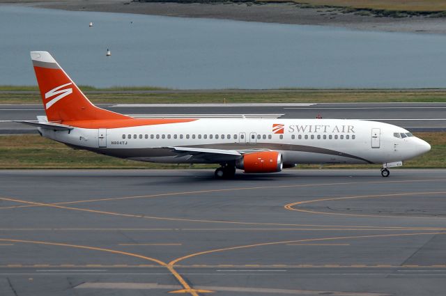 BOEING 737-400 (N804TJ) - Swift Air 4104 taxiing on Bravo