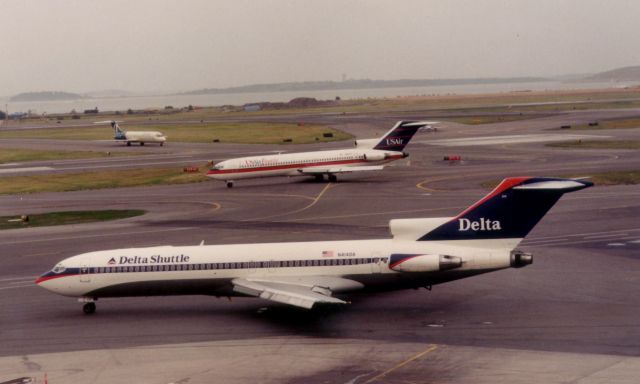 BOEING 727-200 (N414DA) - From July 1998 - Delta Shuttle about to depart while US Air Shuttle taxis in back after arriving followed by an Air Tran DC9. 