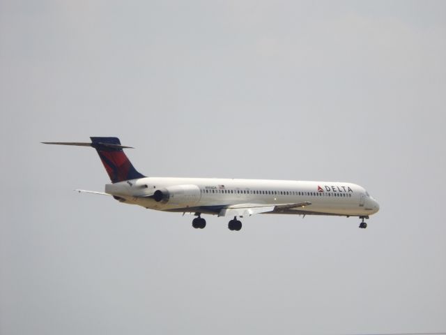 McDonnell Douglas MD-90 (N906DA) - From the 9th floor balcony at the best Western Plus on Central Ave.