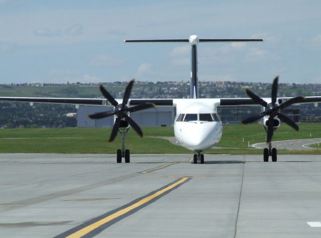 de Havilland Dash 8-400 (C-FOEN) - Tail 401 arriving at YYC, July 2013.