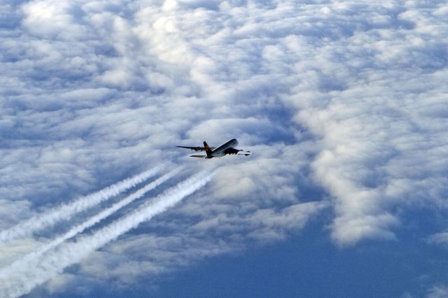 — — - A380 at FL37 overtaking Falcon 900EX at FL39 flying at .84! Camera Canon Eos5 24/70 2.8 - slightly grainy much atmosphere