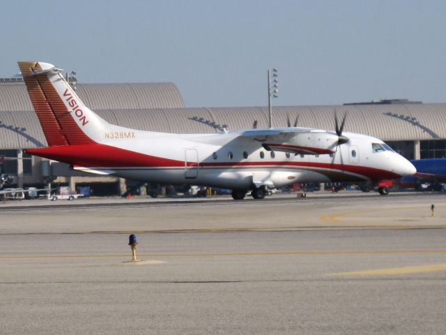 Dornier Do-28D-6 Turbo Skyservant (N328MX) - Holding on RWY 19R