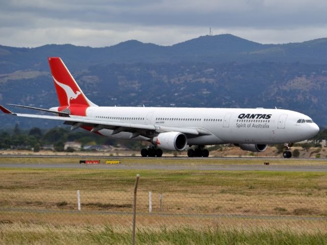 Airbus A330-300 (VH-QPD) - Slowing down on runway 23, on arrival from Sydney en-route to Singapore. Tuesday 27th December 2011.