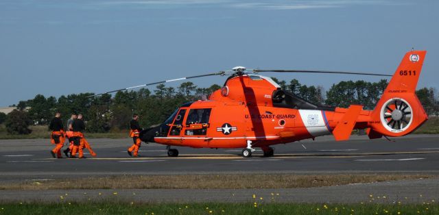 N6511 — - Shown here is a United States Coast Guard Aerospatiale MH-65E Dolphin and its crew about to prep for departure in the Autumn of 2023.