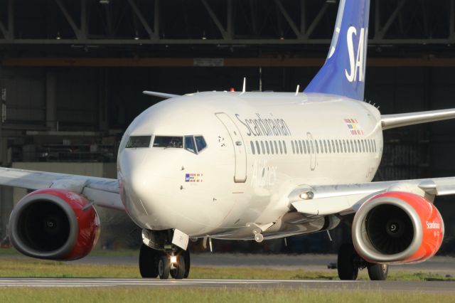 Boeing 737-700 — - Lining up on runway 027R at LHR.