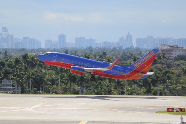 Boeing 737-700 (N408WN) - Southwest Airlines (WN) N408WN B737-7H4 [cn27895]br /Fort Lauderdale (FLL). Southwest Airlines flight WN1857 departing from runway 10R for Nassau Lynden Pindling (NAS). Captured wearing Southwest’s Canyon Blue Livery introduced in 2001 and since September 2014 is being replaced by the Heart livery.br /Taken from Hibiscus/Terminal 1 car park roof level br /br /2018 12 25br /https://alphayankee.smugmug.com/Airlines-and-Airliners-Portfolio/Airlines/AmericasAirlines/Southwest-Airlines-WN/