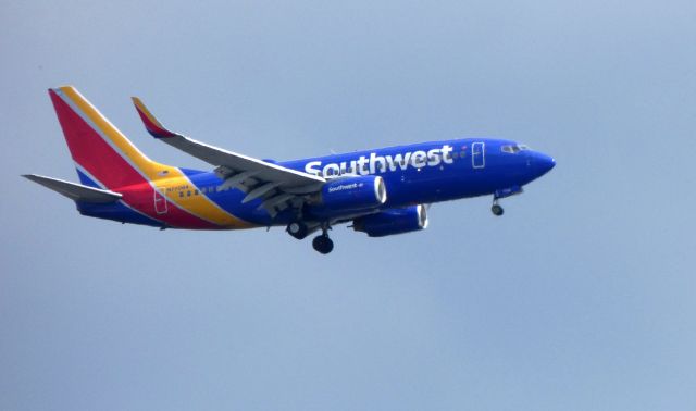 Boeing 737-700 (N7706A) - On final is this Southwest Airlines Boeing 737-700 in the Summer of 2018.