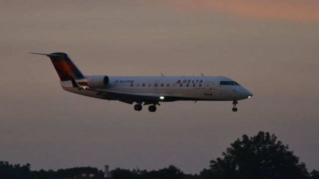 Canadair Regional Jet CRJ-200 (N447SW) - N447SW landing in Sioux Falls SD at sunset.