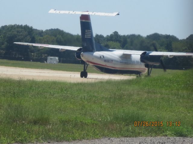 de Havilland Dash 8-200 (N805EX) - Taken: Public Viewing area @ KORFbr /Camera: Canon PowerShot ELPH 110 HS