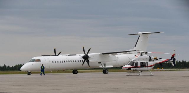 de Havilland Dash 8-400 (G-PTHA) - 15Aug2009.  Flt BEE40 dash8 being delivered from dehaviland to company in UK via Goose Bay.