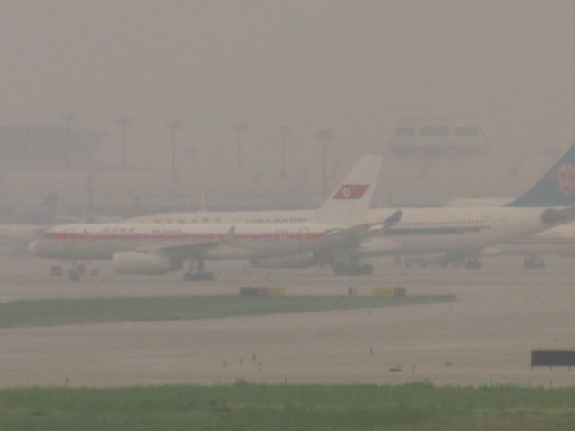 — — - Blurry yet Awesome! My own picture of the North Korean Airlines Tupolev 204... In Beijing Airport!