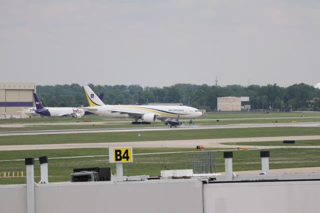 BOEING 777-200LR (N707GT) - MSC's "Antares" on departure for maintainence in KCVG ft South Dakota F16 89174