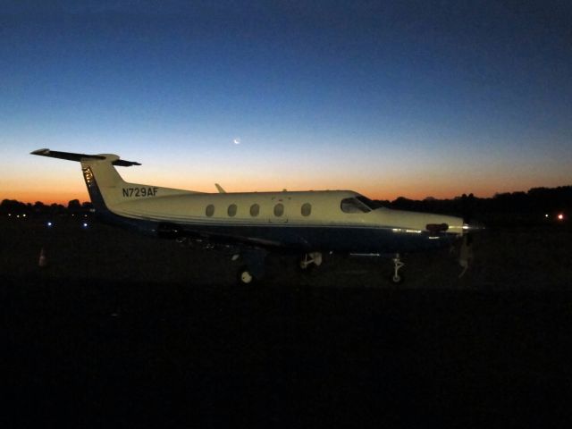 Pilatus PC-12 (N729AF) - Sunrise at the Bridgeport KBDR airport.