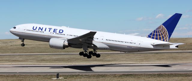 Boeing 777-200 (N781UA) - Departing from runway 25 for Honolulu.